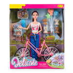 Poupée delicate avec vélo